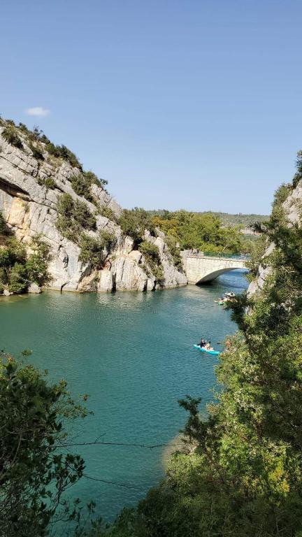 a group of people in a boat on a river at Charmant maset provençal in Montmeyan