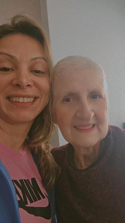 two women are standing next to each other at Hotel in Sao Paulo