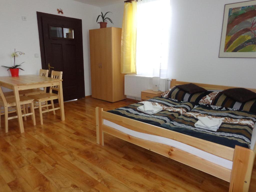 Postel nebo postele na pokoji v ubytování Apartmán Bára