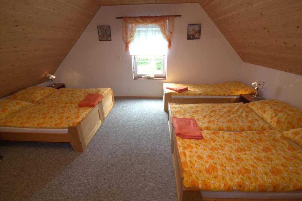 Postel nebo postele na pokoji v ubytování Orange House