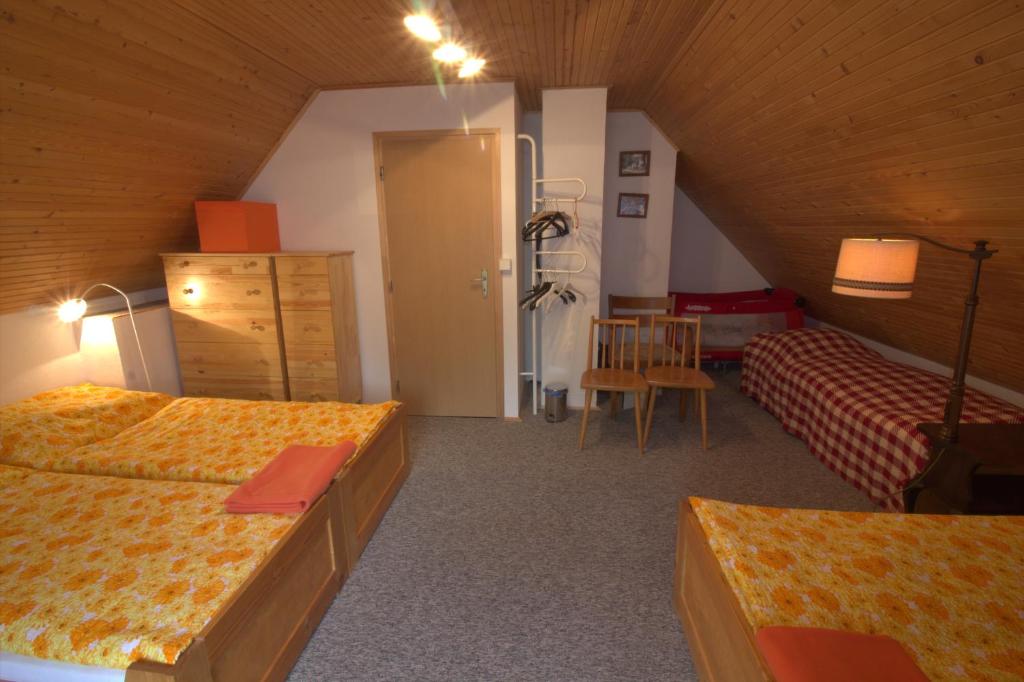 Postel nebo postele na pokoji v ubytování Orange House