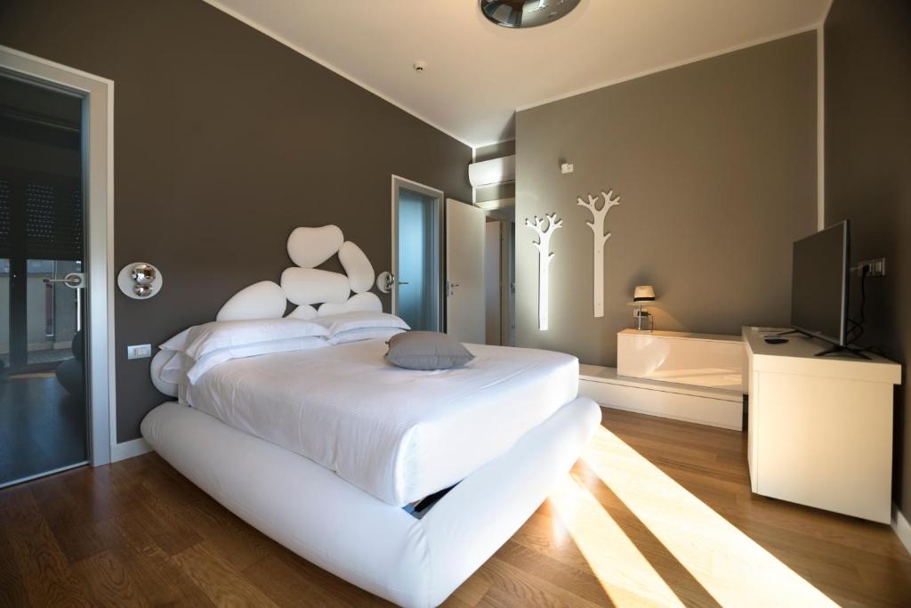 Postel nebo postele na pokoji v ubytování The One Hotel - Designed for Adults - Pet lovers