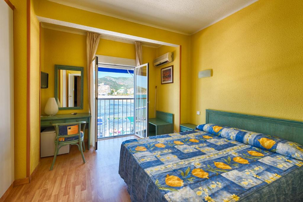 Postel nebo postele na pokoji v ubytování Hotel Marina