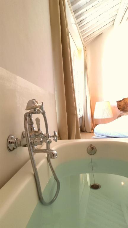 Posteľ alebo postele v izbe v ubytovaní B&B A Piazza del Gesù