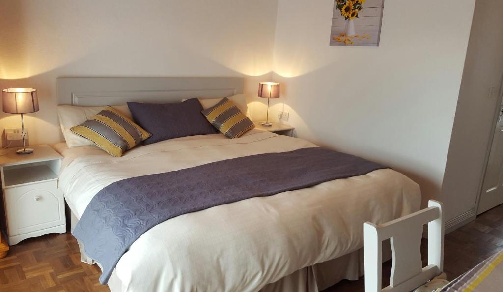 Postel nebo postele na pokoji v ubytování Donemark Rise B&B