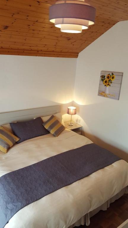 Postel nebo postele na pokoji v ubytování Donemark Rise B&B