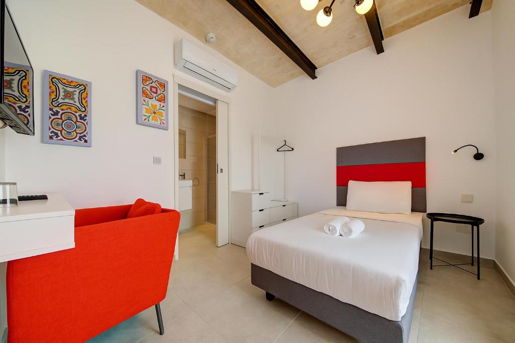 Postel nebo postele na pokoji v ubytování Casa San Domenico 8 by Vallettastay
