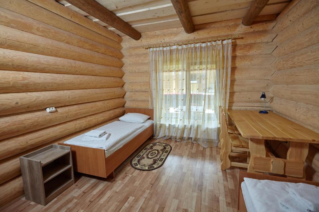 Postel nebo postele na pokoji v ubytování Chudodievo in Chynadievo Mini-Hotel