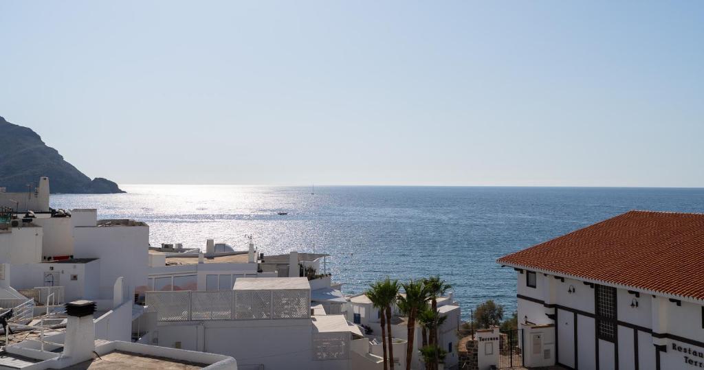 a view of the ocean from a city at Bahía Sol in San José