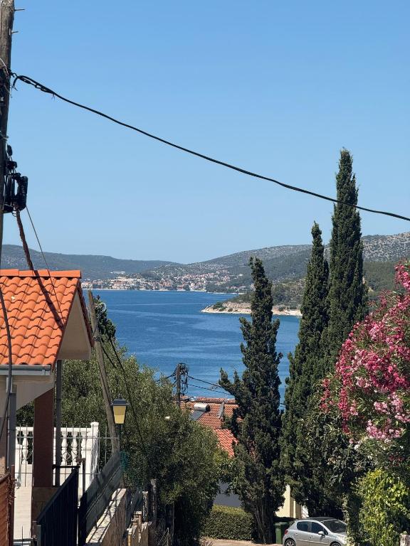 a view of the ocean from a house at Villa Buenavista Trogir-Seget Vranjica in Seget Vranjica