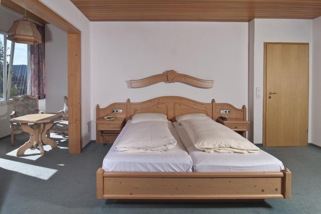 Postel nebo postele na pokoji v ubytování Action Forest Hotel - Kletterwald - Lasertag - nähe Badeparadies