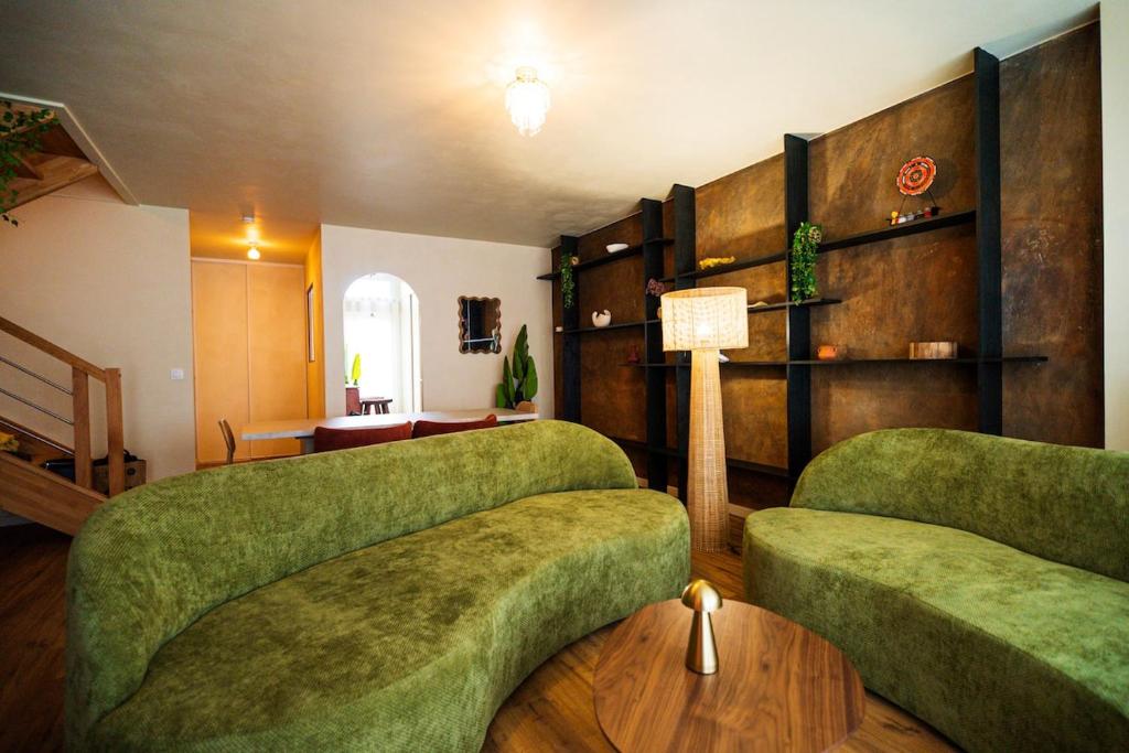 Posezení v ubytování Triplex Design avec Rooftop et Salle Cinéma