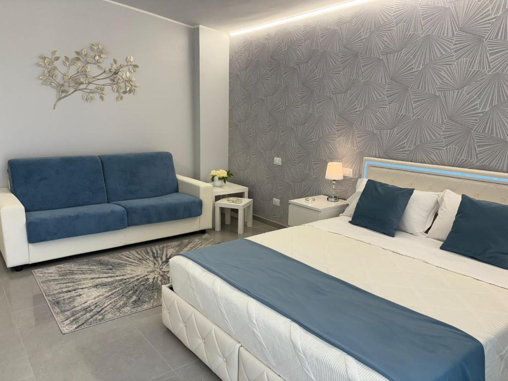 Postel nebo postele na pokoji v ubytování Ranieri Guest House