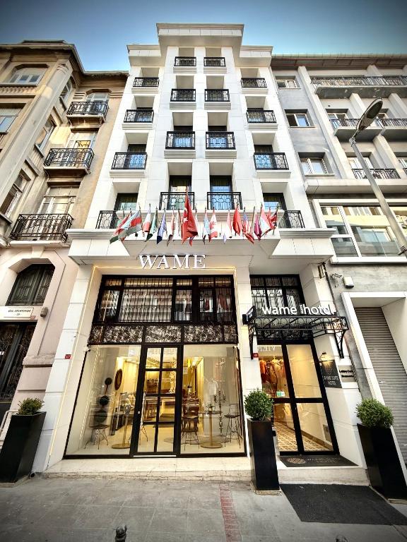 a facade of a building with a willemite hotel at Wame Suite Hotel Nisantasi in Istanbul