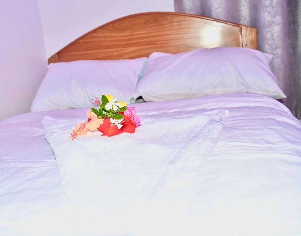 Postel nebo postele na pokoji v ubytování Michamvi Holiday Homes- 102