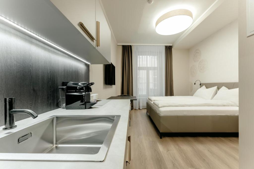 Aparthotel Lavilo Main Square - Resim 9