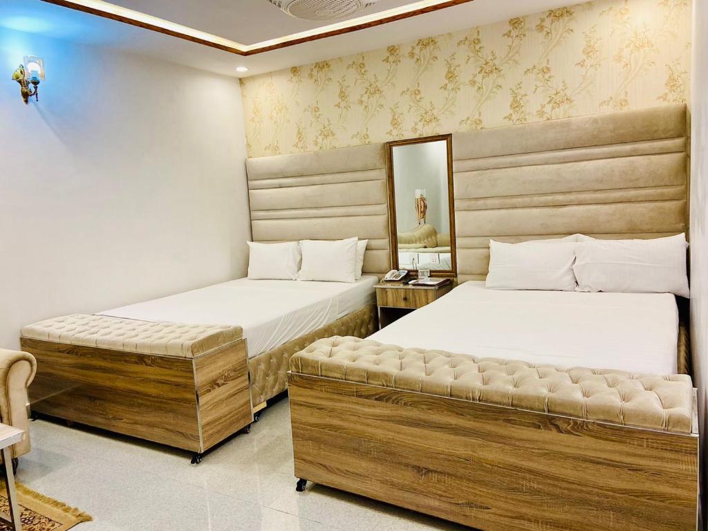 Neshaz Hotel & Suites - Quarto Quádruplo Deluxe