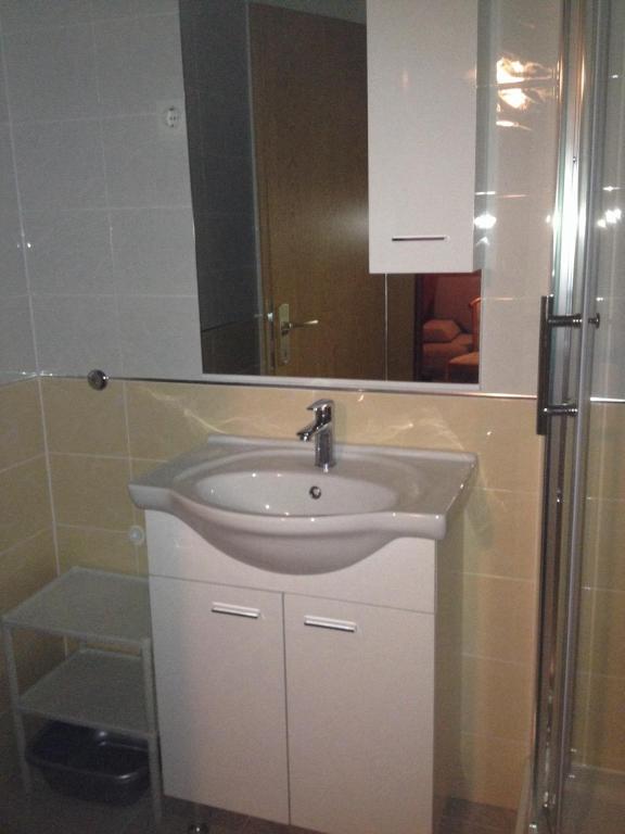 Kúpeľňa v ubytovaní Apartments Mladina