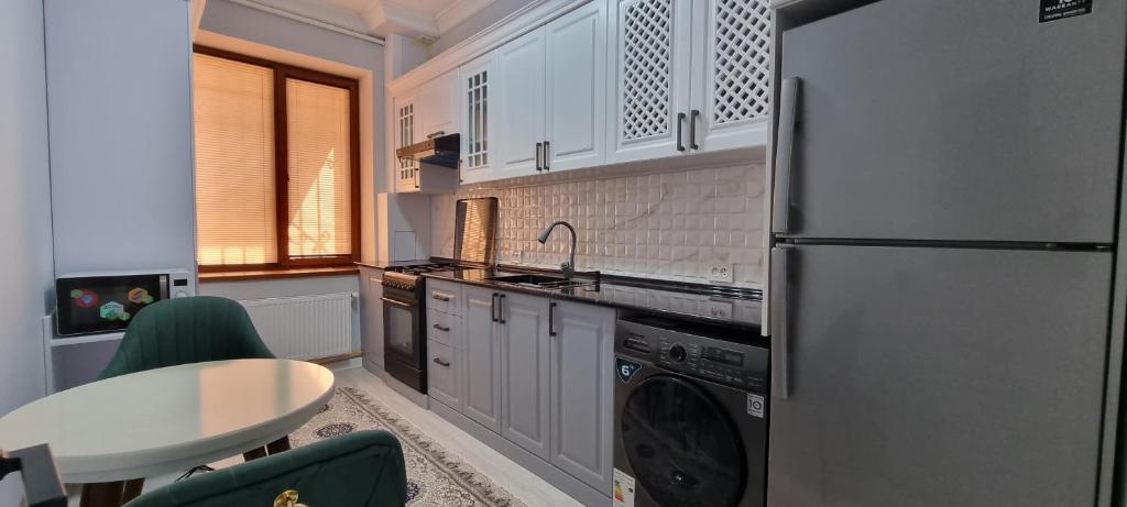 Kuchyň nebo kuchyňský kout v ubytování Asia Luxe Apartment