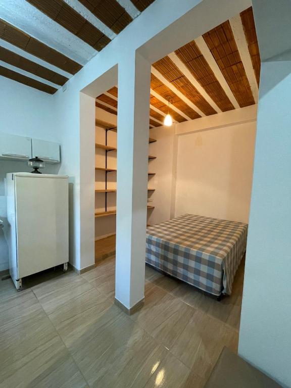 Ένα ή περισσότερα κρεβάτια σε δωμάτιο στο Casa pequena e aconchegante em Passa Quatro, MG