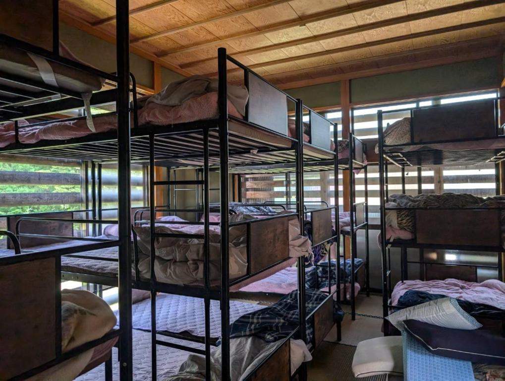 a group of bunk beds in a room at Kominka Mimi - Vacation STAY 19741 