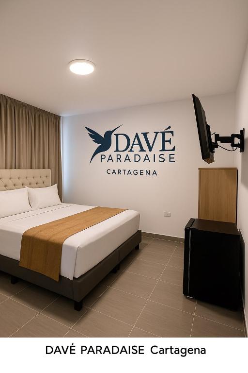Postel nebo postele na pokoji v ubytování Davé Paradise