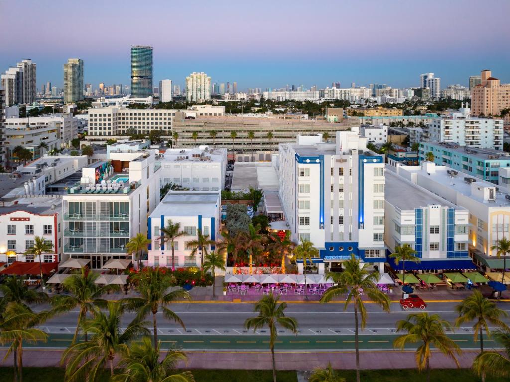 a city skyline with palm trees and buildings at Park Central South Beach in Miami Beach