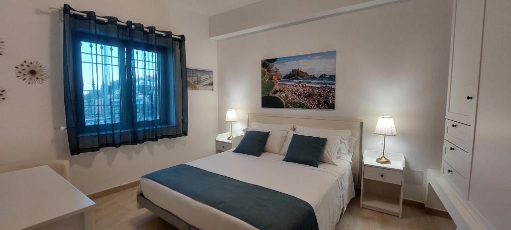 Ένα ή περισσότερα κρεβάτια σε δωμάτιο στο a PICCIRIDDA