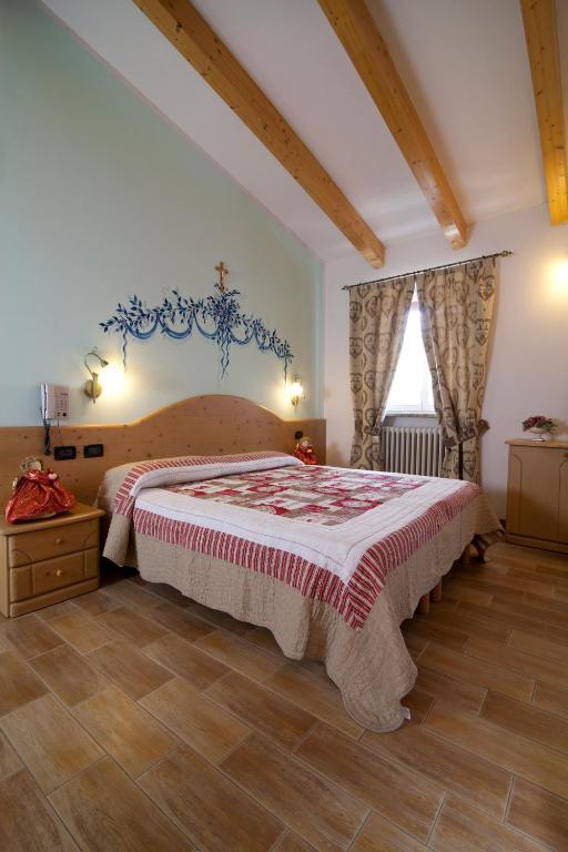 Postel nebo postele na pokoji v ubytování Hotel Sport