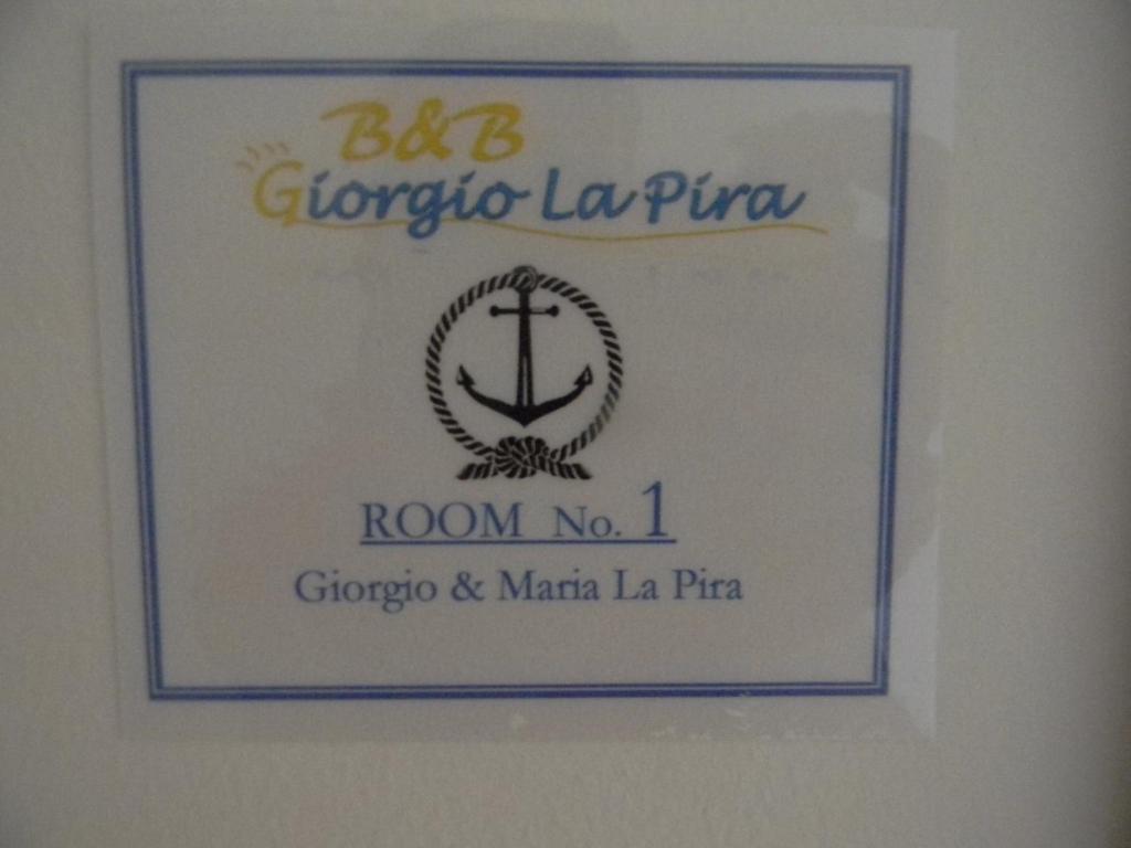 Certifikát, hodnocení, plakát nebo jiný dokument vystavený v ubytování B&B Giorgio La Pira