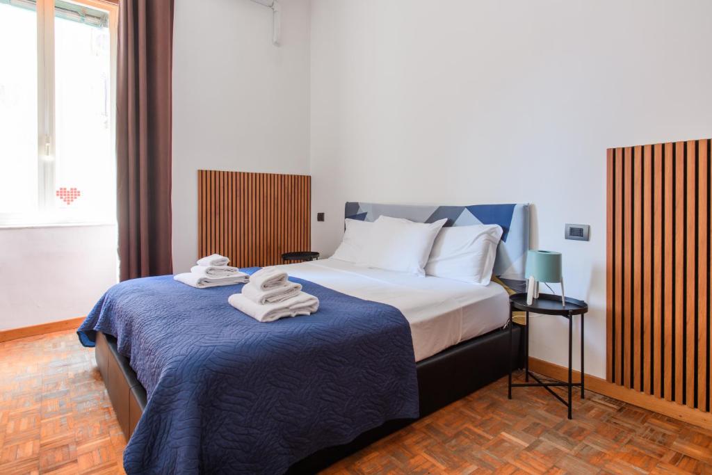 Postel nebo postele na pokoji v ubytování Inside Chiaia Rooms