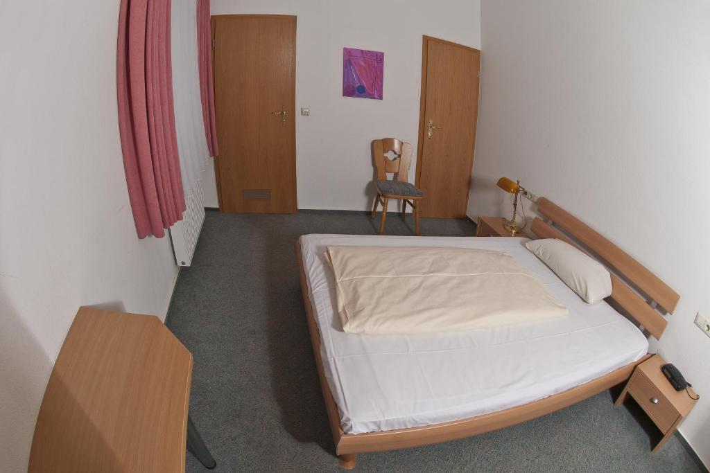 Postel nebo postele na pokoji v ubytování Action Forest Hotel - Kletterwald - Lasertag - nähe Badeparadies