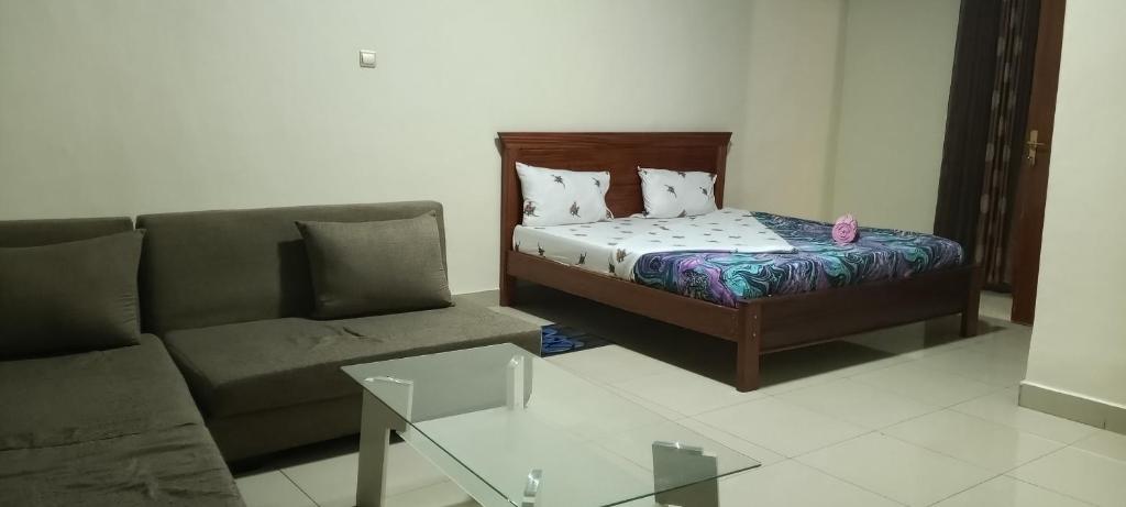 Postel nebo postele na pokoji v ubytování Simp & Comfort