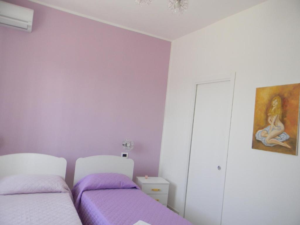 Postel nebo postele na pokoji v ubytování B&B Giorgio La Pira