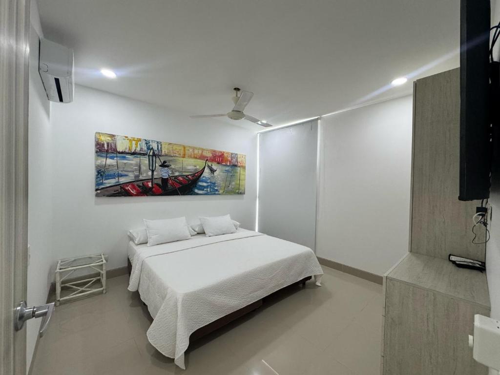 Ένα ή περισσότερα κρεβάτια σε δωμάτιο στο Apartamento frente al mar