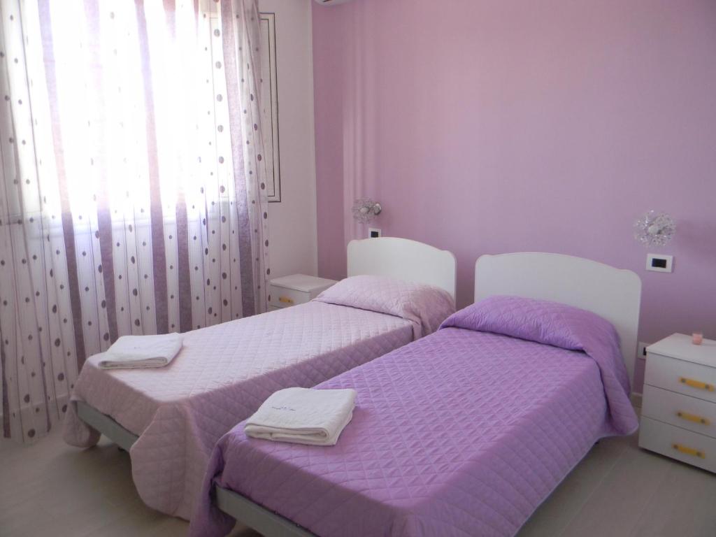 Postel nebo postele na pokoji v ubytování B&B Giorgio La Pira