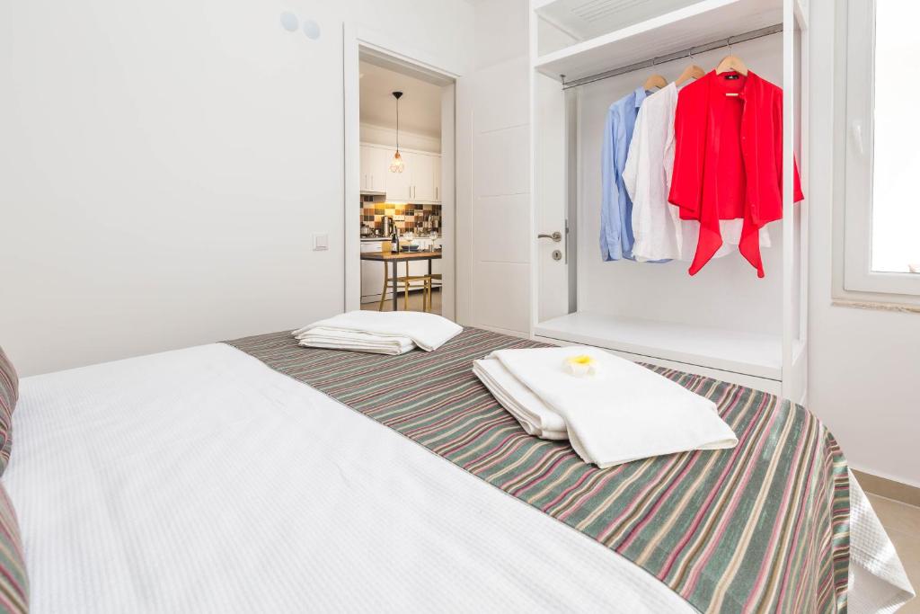 Postel nebo postele na pokoji v ubytování Erdem City Apart