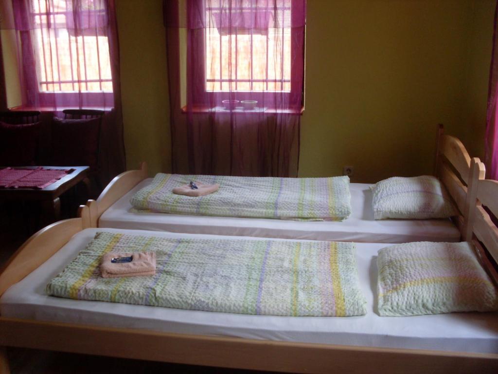 Postel nebo postele na pokoji v ubytování Apartments Vratnik