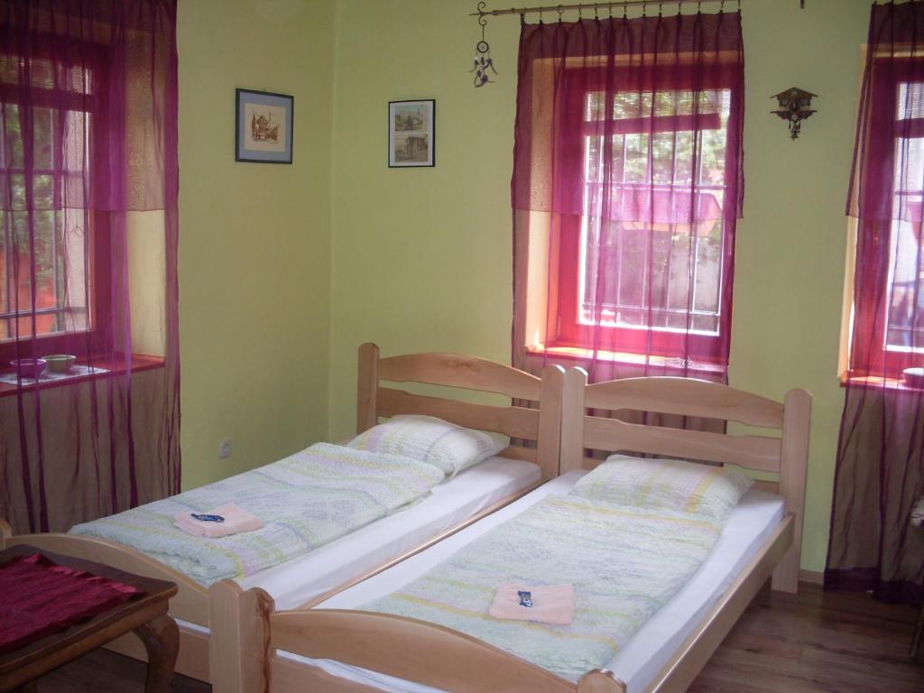 Postel nebo postele na pokoji v ubytování Apartments Vratnik