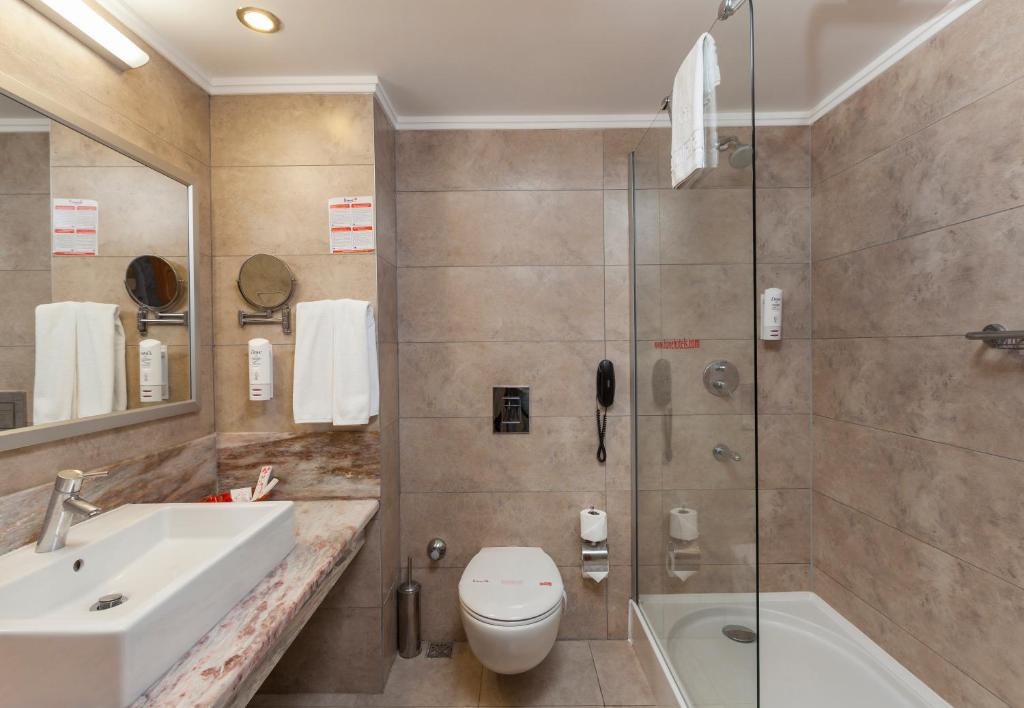 Koupelna v ubytování Calimera Hane Garden Hotel