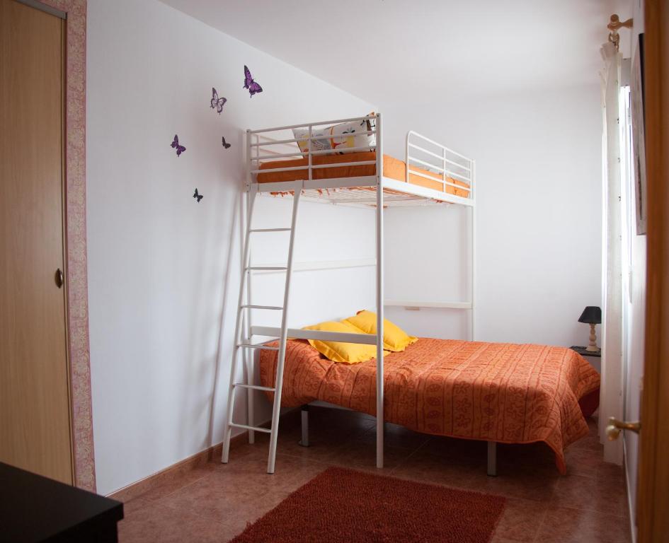 Postel nebo postele na pokoji v ubytování Casa Rural Marchena