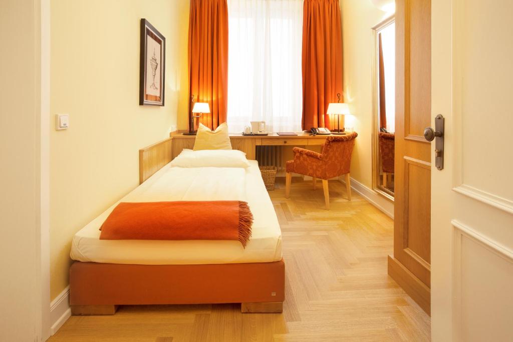 Cama ou camas em um quarto em Hotel Villa Florentina