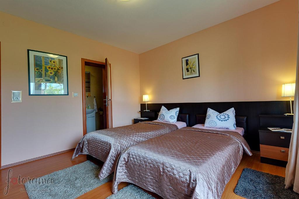 Postel nebo postele na pokoji v ubytování Rooms Stanic