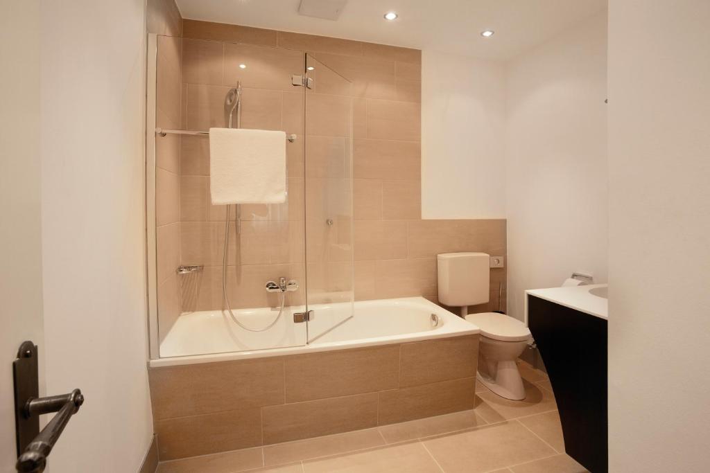 Um banheiro em Hotel Villa Florentina