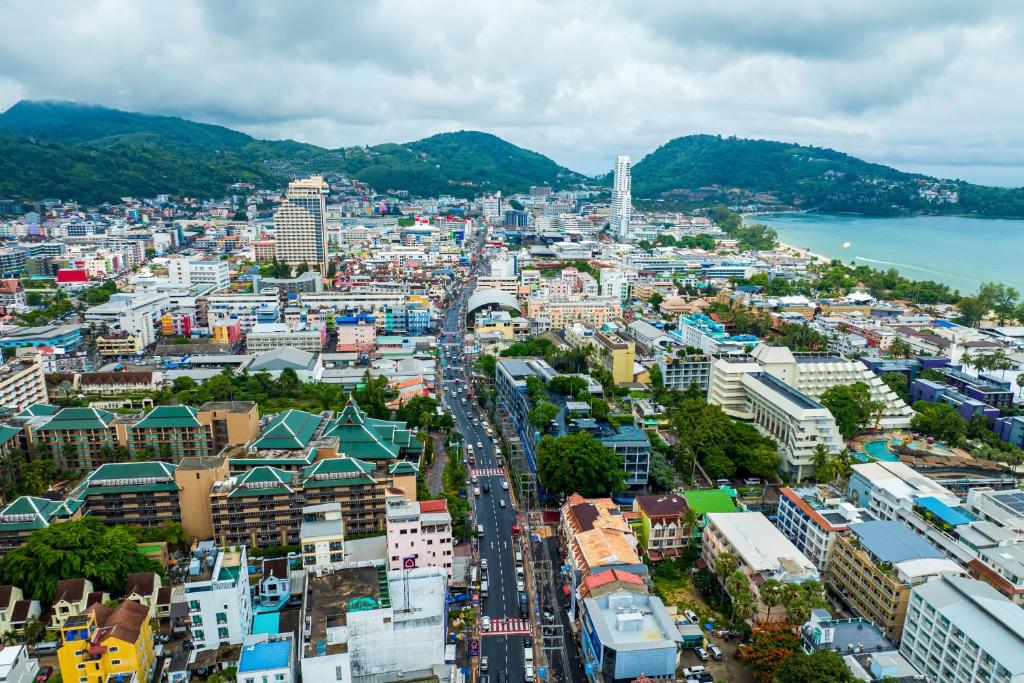 an aerial view of a city with buildings at The Chic Patong Hotel in Patong Beach