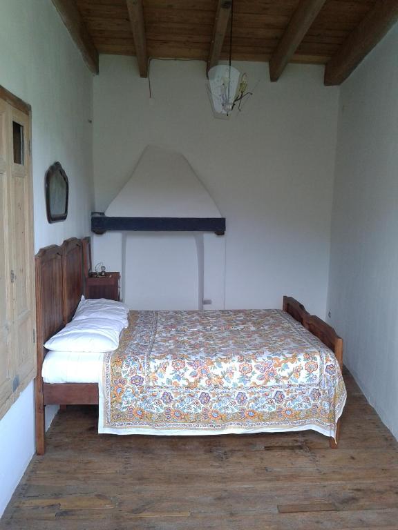 Postel nebo postele na pokoji v ubytování Rural House Rondini