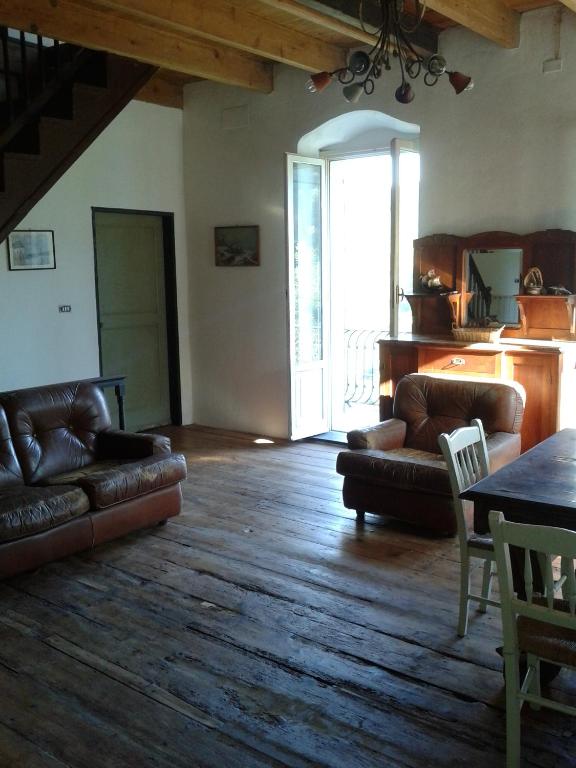 Posezení v ubytování Rural House Rondini