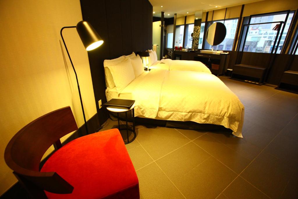 Postel nebo postele na pokoji v ubytování Hotel Lainn