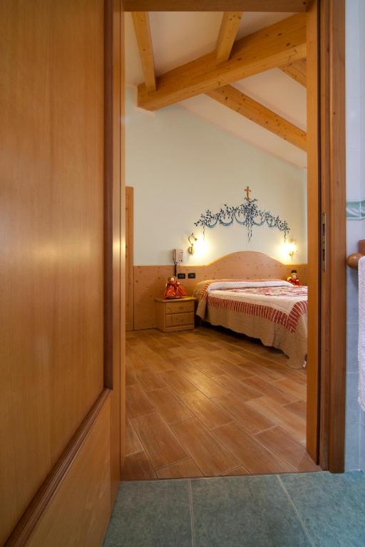 Postel nebo postele na pokoji v ubytování Hotel Sport