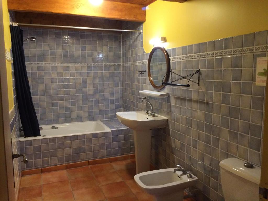 Um banheiro em Le Moulin de Lande